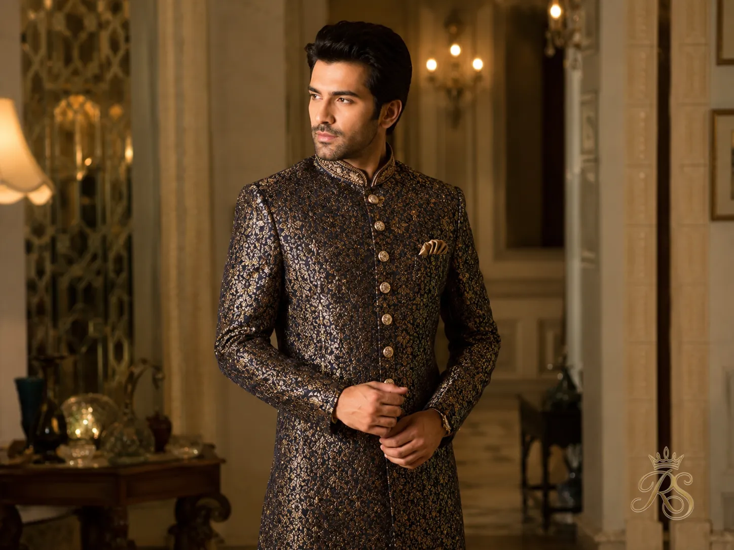 Brocade-inspired sherwani with intricate metallic detailing and regal depth